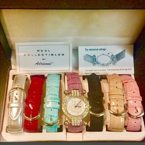 Adrienne crystal accent watch w/leather straps.